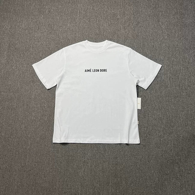 Aimé Leon Dore Minimal Crest Tee - White Hover Image